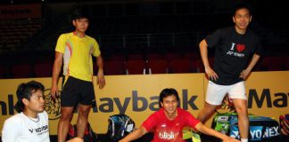 World champion men's doubles pair, Mohd Ahsan (2nd right) and Hendra Setiawan (right) warm down after a training session for the Malaysian Open badminton championship beginning on Wednesday at Bukit Jalil.