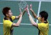 Lim Khim Wah (right) celebrates with Goh V Shem after beating Chinese pair Hong Wei-Chai Biao during the Malaysian Open last Sunday.