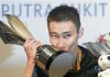 Lee Chong Wei kisses his trophy after winning the Maybank Malaysia Open yesterday.