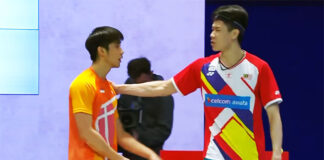 Loh Kean Yew (L) talks to Lee Zii Jia after Lee retires from the HYLO Open final. (photo: BWF)