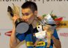 Lee Chong Wei kisses the Malaysian Open trophy after securing his record 10th home title in 2014.