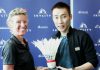 Julie Carrel presented a souvenir to Lee Chong Wei during a partnership ceremony between SKYCITY and Badminton New Zealand in December 2012. (photo: Reuters)