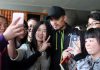 Lin Dan surrounded by his fans at the Badminton Asia Championships at Wuhan, China