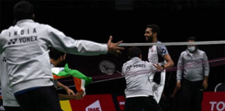 Teammates rush to the court after HS Prannoy scores the winning point to give India a 3-2 victory against Denmark in the 2022 Thomas Cup semi-final. (photo: Shi Tang/Getty Images)