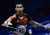 Lee Chong Wei returns a shot against France's Kai Schaefer. (photo: AFP)