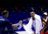 Lin Dan shakes hand with Peter Gade after Monday's match. (photo: AFP)