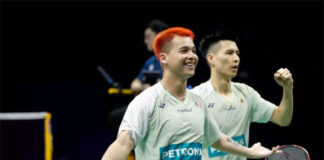 Ong Yew Sin/Teo Ee Yi celebrate after winning the third point for Malaysia over Chinese Taipei. (photo: Shi Tang/Getty Images)