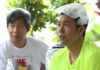 Hendra Setiawan with ice bag on his head.