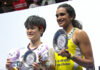 PV Sindhu and Wang Zhiyi pose for pictures at the awards ceremony.