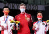 V for Victory: Viktor Axelsen (Center) denies Chen Long (Left) to win the 2020 Tokyo Olympics gold medal. (photo: Lintao Zhang/Getty Images)