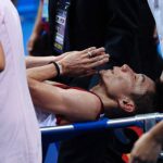 Lee Chong Wei is stretchered away during his World Badminton Championships final against Lin Dan in Guangzhou on August 11, 2013. Lin's win was overshadowed by the failure of the air conditioning mid-match, fuelling conspiracy theories and possibly contributing to Lee's withdrawal on a stretcher with cramp.