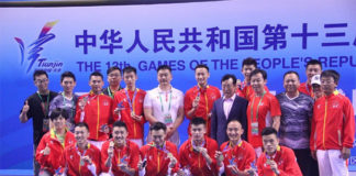 Lin Dan and Beijing's men's team lift trophies after winning the China National Games final in Tianjin. (photo: Lin Dan)