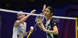 An Se Young greets Tai Tzu Ying after the 2023 China Open semi-finals. (photo: Shi Tang/Getty Images)