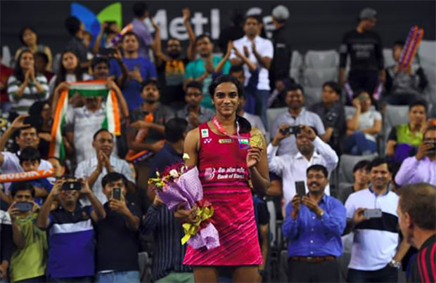 P.V Sindhu poses with her Korea Open medal. (photo: AP)