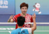 Shi Yuqi greets Lu Guangzu after winning the men's singles gold medal at China's 14th National Games. (photo: Weibo)