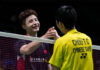 Chou Tien Chen greets Shi Yu Qi after the first round match of 2023 Malaysia Open. (photo: Shi Tang/Getty Images)