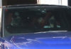 Lee Chong Wei and family leave Subang airport with a blue SUV. (photo: Sinchew)