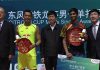 Lin Dan laughs with K. Srikanth on the podium at the China Open Super Series Premier event
