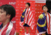 Goh Jin Wei stands on the podium for the Malaysia national anthem after winning the world junior gold. (photo: BadmintonCanada)