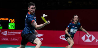 Tan Kian Meng/Lai Pei Jing win their first match against Wang Yi Lyu/Huang Dong Ping at the 2022 BWF World Tour Finals. (photo: Shi Tang/Getty Images)