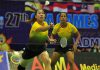 Singapore's Yao Lei (L) and Shinta Mulia Sari during the badminton women's doubles quarter final round at the 27th SEA Games in Myanmar on 12 Dec 2013.